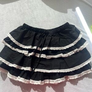 Elegant Black Tiered Mini Skirt with White Lace